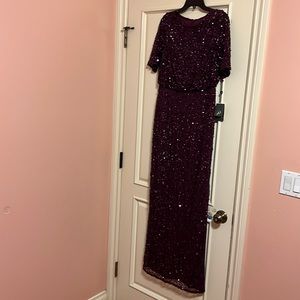 Adrianna Papell purple sequined evening gown.